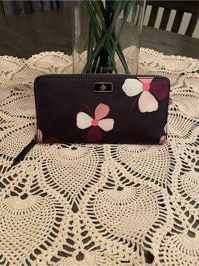 Kate Spade Dawn Dusk Buds Large Continental Wallet in a black and floral print